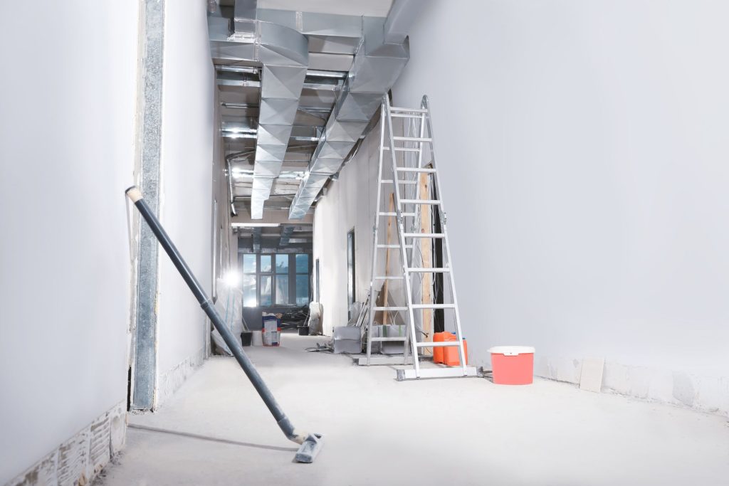 Eshine Cleaning Services team performing post-construction cleaning in Calgary building